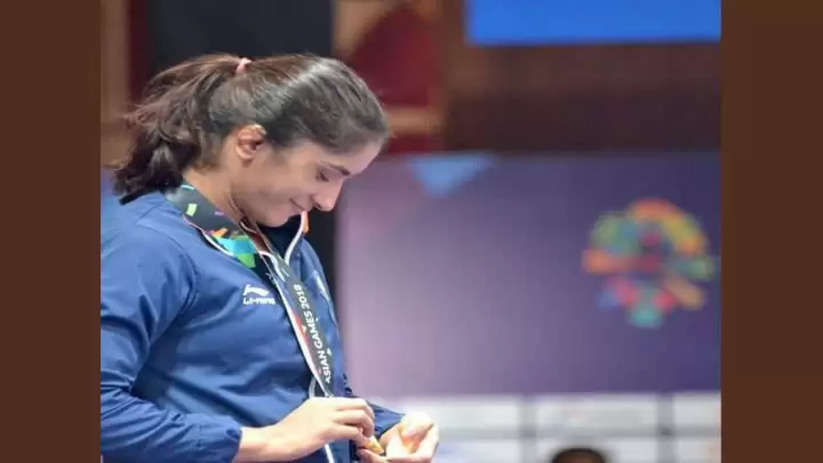 Vinesh Phogat announces retirement from wrestling after Paris Olympics disqualification, Vinesh Phogat, Paris Olympics, Wrestling, Retirement, Controversy.