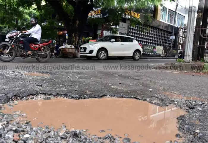 rain damaged roads pose threat to motorists