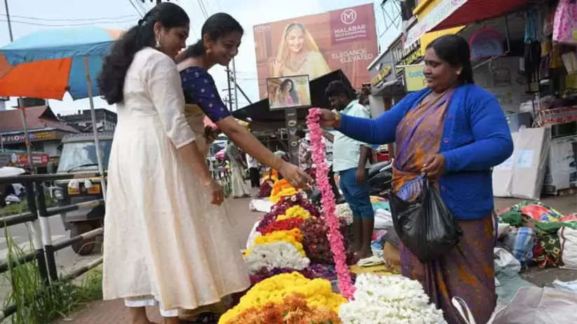 Flower Vendors from Karnataka Bring Variety to Kasargod for Onam