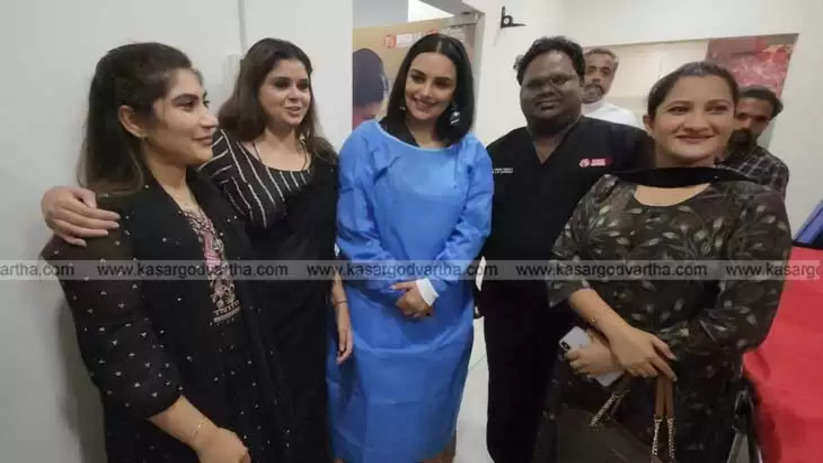 Swetha Menon's Viral Photo in Hospital Gown at Vintach Hospital Opening